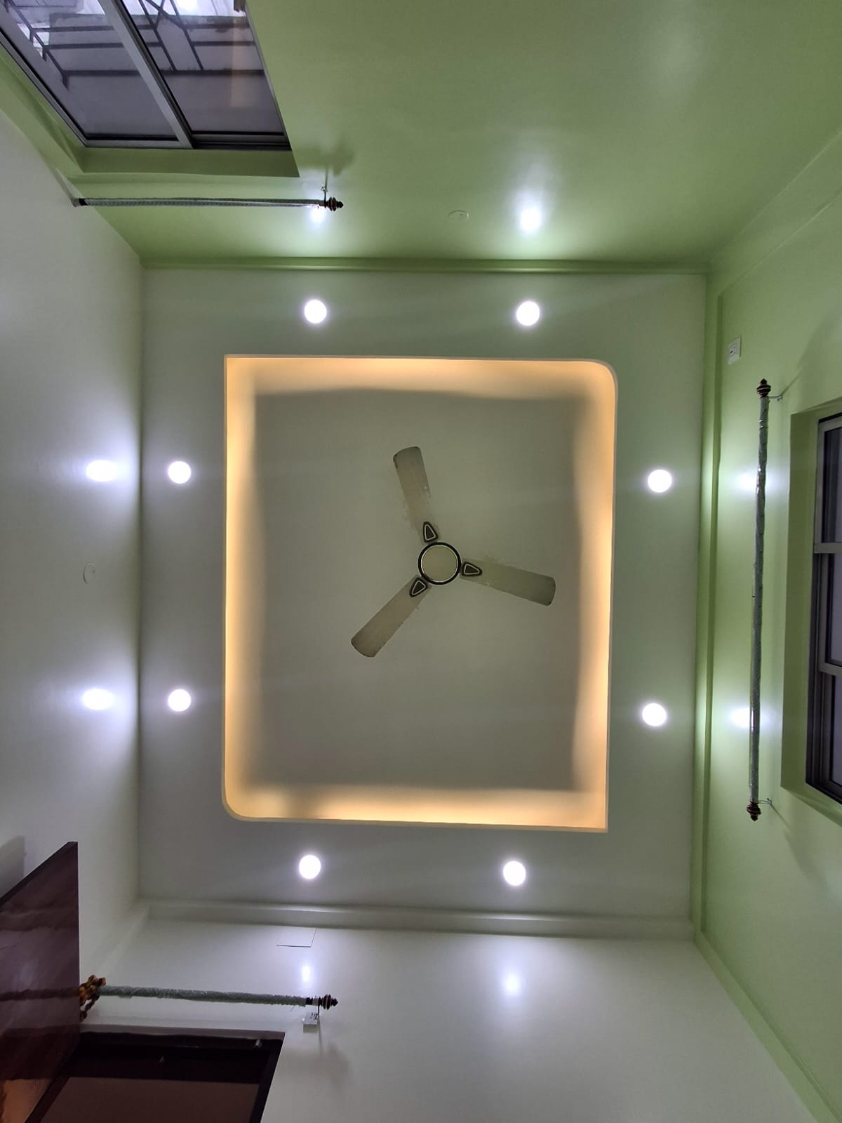 Minimalist False Ceiling with Warm Cove Lighting